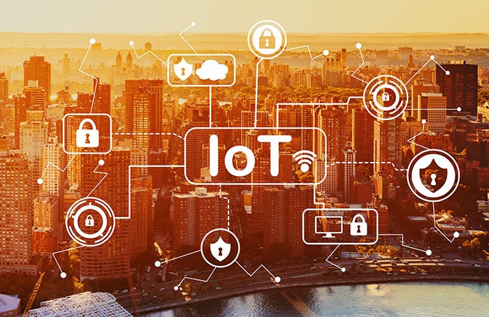 Icons of Internet of Things transposed over a city