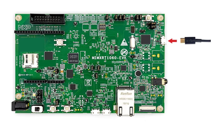 Power the development board with a micro-USB cable plugged into the micro-USB port on the right side of the board.