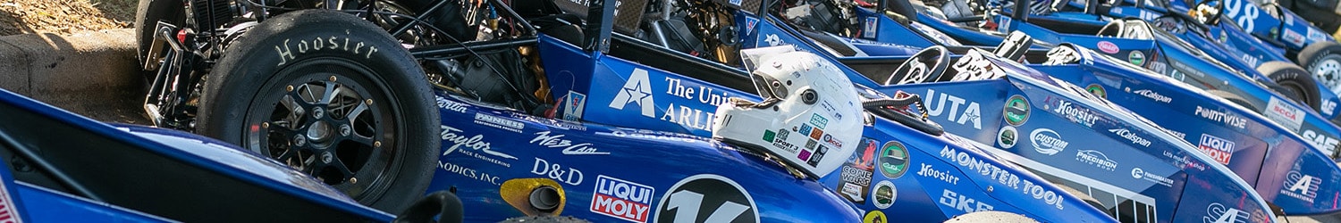 Row of parked UTA racecars